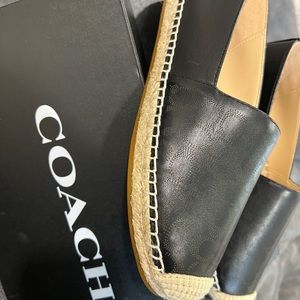 Women Coach black flats.